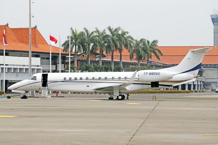 Small Jet in Front of a Building